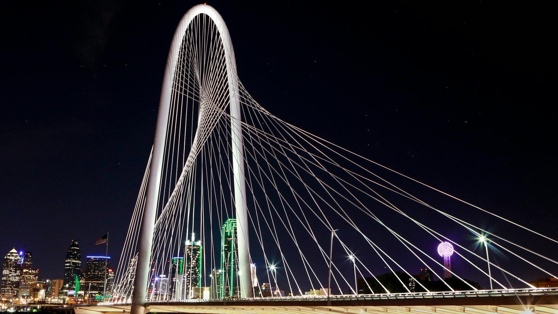 Dallas skyline and Margaret Hunt Hill Bridge at night — FIFA World Cup 2026 luxury limo service